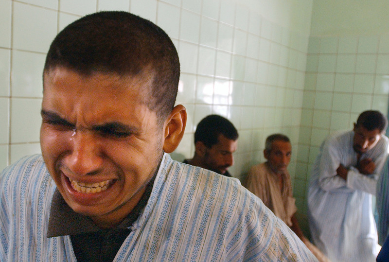 An agitated mental patient cries at Rashad psychiatric hospital recieve psychiatric Friday.