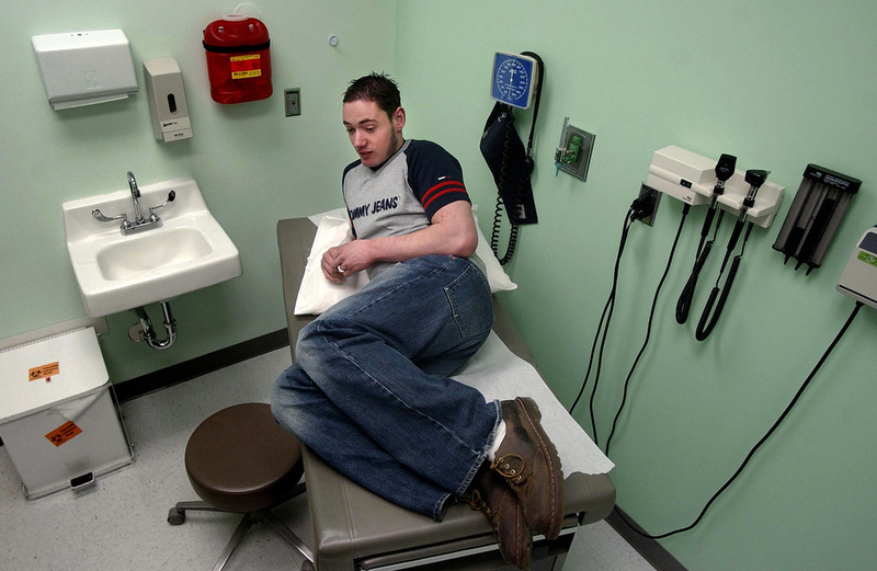 Jonathan waits on the exam table during his twice-yearly AIDS check-up in Salt Lake City. He is examined to check on his viral load and overall health. Jonathan has practically grown up in doctor's offices and hospitals. He was also a participant in numerous clinical trials that put him at the vanguard in the treatment of AIDS.