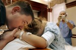 Jonathan comforts his wife Amber in the delivery room as she begins to go into labor. Jonathan, who was told that he would die since he was a boy says that he has to live now to take care of his wife and child.